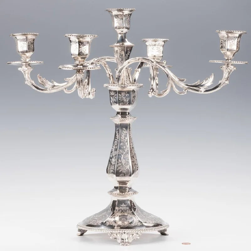 Modern silver three arm candelabra showcasing a swooping branches, available at wholesale prices.