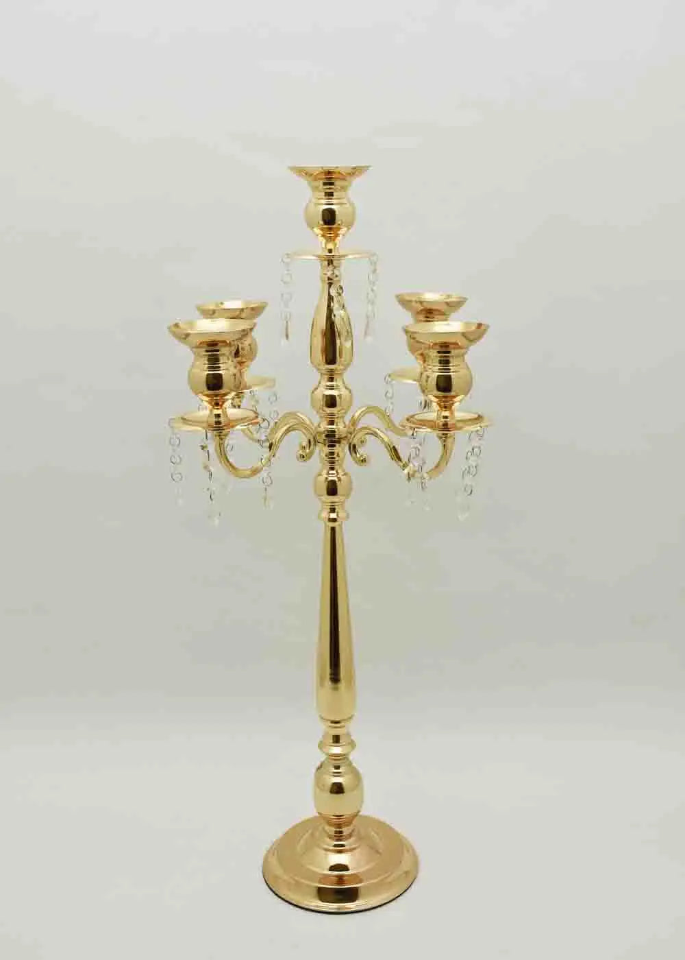 Modern silver three arm candelabra showcasing a swooping branches, available at wholesale prices.